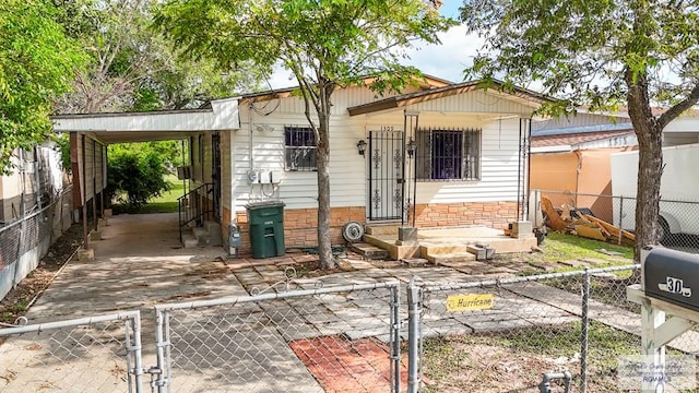 view of front of house with a carport