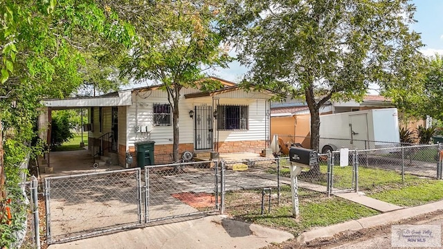 manufactured / mobile home featuring a carport