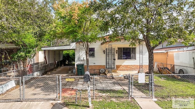 view of front of home featuring a carport