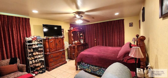 bedroom with light tile patterned floors, a ceiling fan, and recessed lighting
