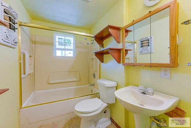 22916 N Oscar St, Harlingen, TX 78552 - full bath with bathtub / shower combination and a textured wall