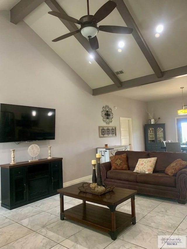 living room featuring lofted ceiling with beams and ceiling fan