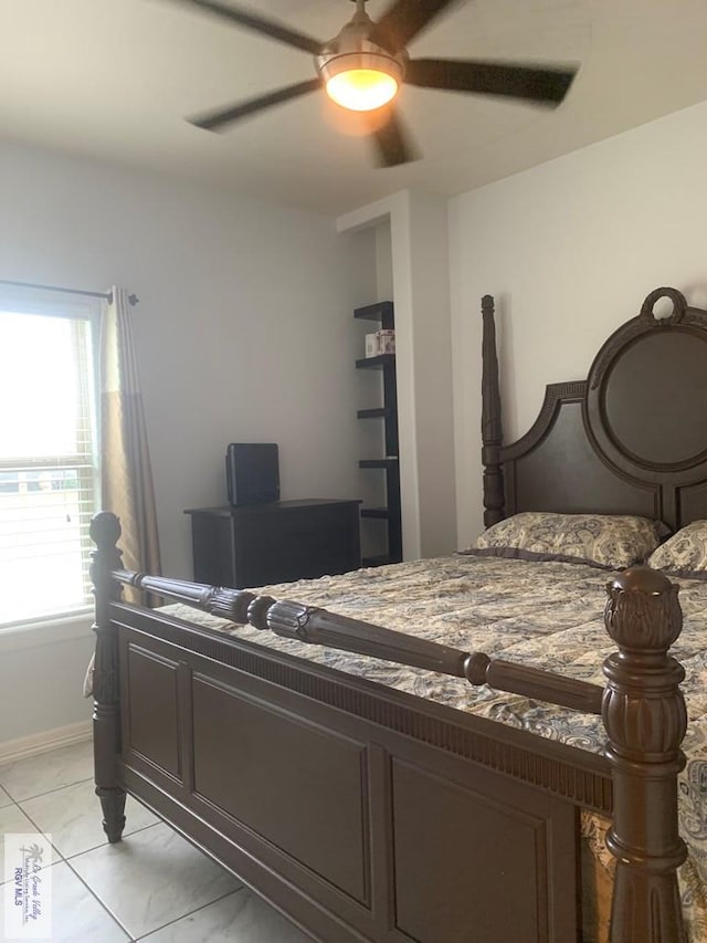 bedroom featuring ceiling fan