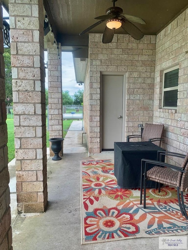 view of patio featuring ceiling fan