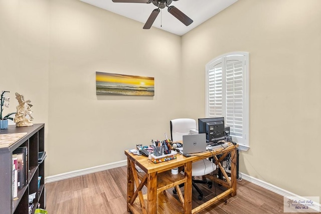 office space featuring hardwood / wood-style flooring and ceiling fan