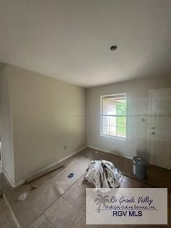 1022 Madison Ave, Harlingen, TX 78550 - unfurnished room featuring tile patterned flooring