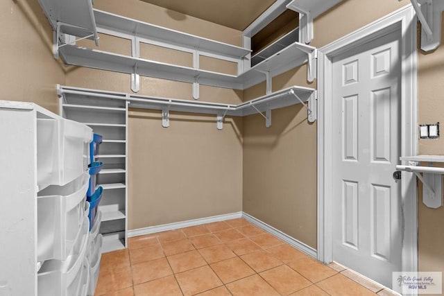 2107 S Victoria Rd, Donna, TX 78537 - walk in closet featuring tile patterned floors