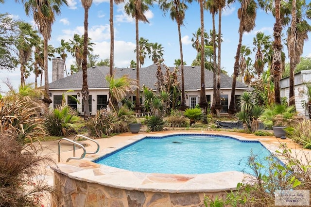 2107 S Victoria Rd, Donna, TX 78537 - outdoor pool featuring a patio