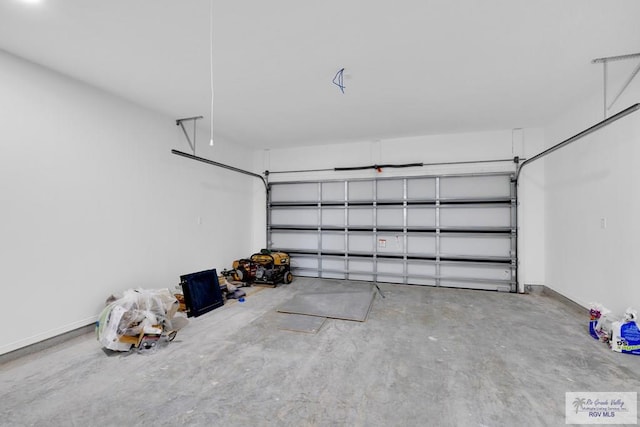 garage featuring baseboards