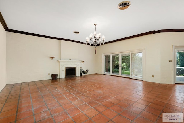 unfurnished living room with tile patterned flooring, a notable chandelier, a healthy amount of sunlight, and ornamental molding