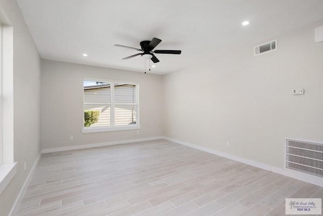 unfurnished room featuring light wood-style floors, visible vents, a ceiling fan, and recessed lighting