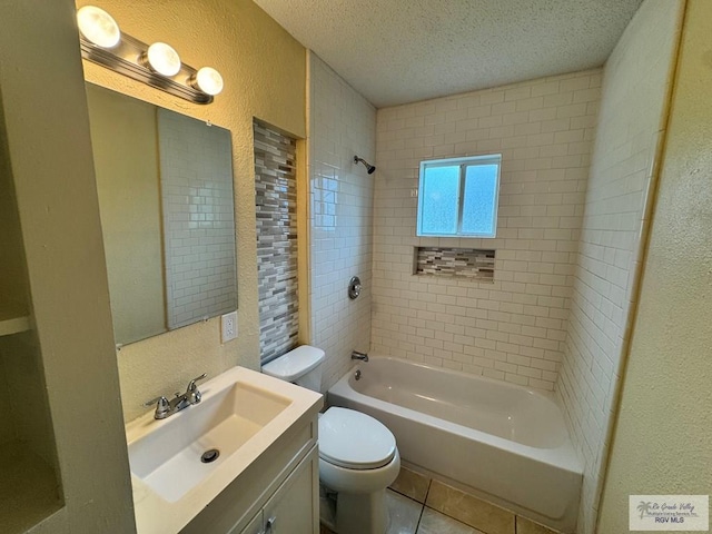 1017 E Austin Ave, Harlingen, TX 78550 - full bathroom featuring a textured wall, a textured ceiling, vanity, toilet, and tile patterned flooring