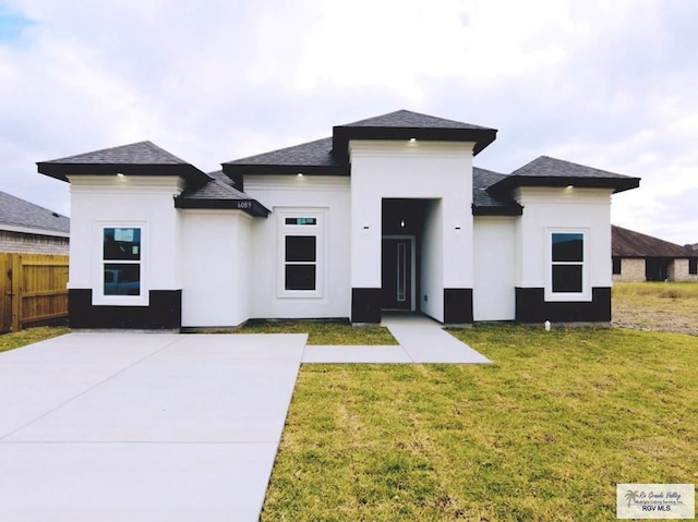 prairie-style house with a front yard