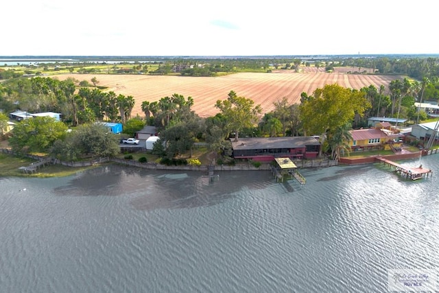 bird's eye view featuring a water view and a rural view