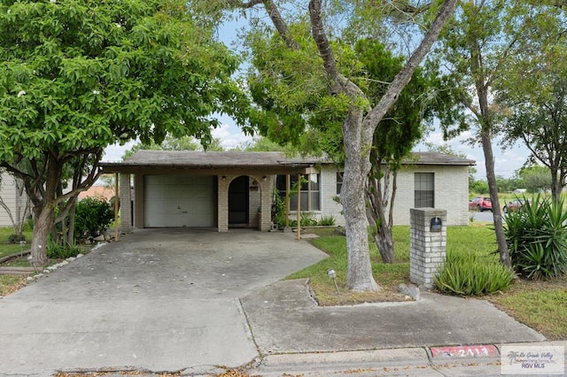 ranch-style home featuring a garage