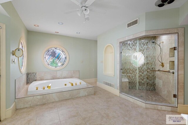 1700 Tesoro Ave, Rancho Viejo, TX 78575 - bathroom with a bath, a shower stall, a ceiling fan, tile patterned floors, and recessed lighting