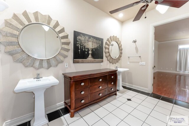 405 E Matz Ave, Harlingen, TX 78550 - bathroom featuring ceiling fan, baseboards, and tile patterned flooring