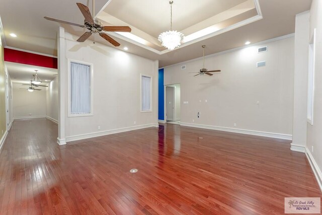 405 E Matz Ave, Harlingen, TX 78550 - unfurnished room with ceiling fan, wood-type flooring, a tray ceiling, ornamental molding, and recessed lighting