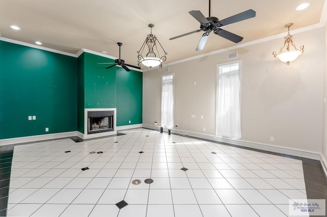 unfurnished living room featuring ceiling fan, light tile patterned floors, and crown molding