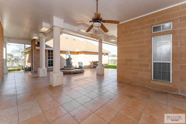 view of patio / terrace featuring ceiling fan