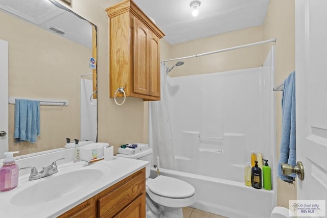 full bathroom featuring tile patterned flooring, vanity, shower / bath combination, and toilet