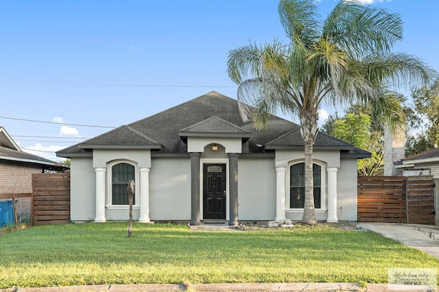 view of front of home with a front yard