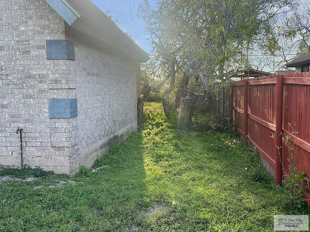 view of yard featuring fence