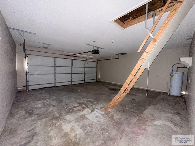 garage with water heater and a garage door opener