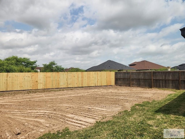 view of yard with fence