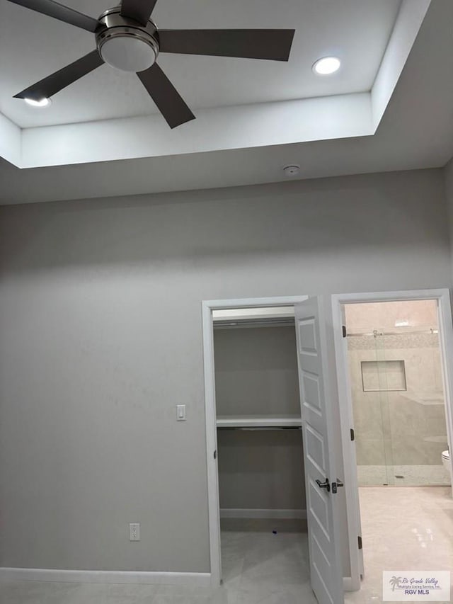 interior space with recessed lighting, ceiling fan, and baseboards