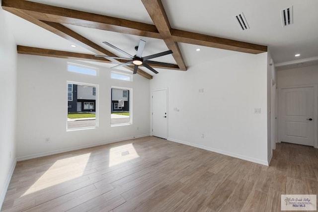 unfurnished room with vaulted ceiling with beams, ceiling fan, and light wood-type flooring