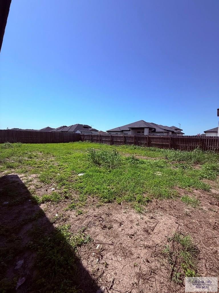 9608 Lake Concordia Ct, Los Fresnos, TX 78566 - view of yard featuring fence