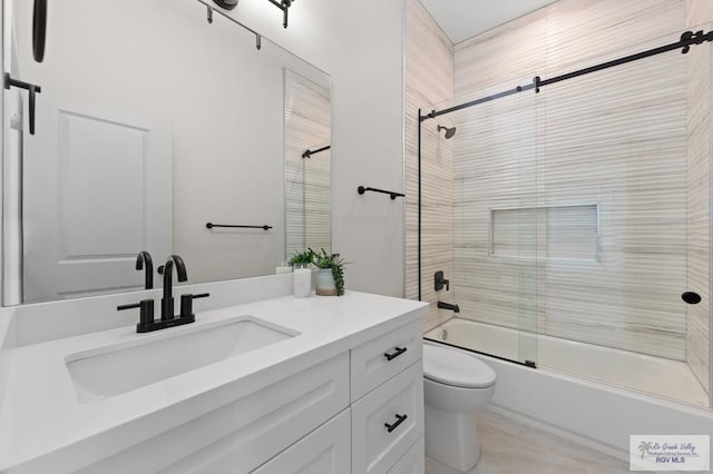 213B W Cora Lee Dr Unit B, South Padre Island, TX 78597 - bathroom featuring vanity and bath / shower combo with glass door