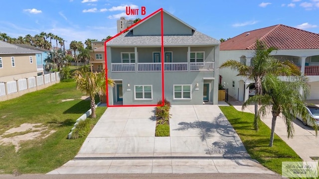 213B W Cora Lee Dr Unit B, South Padre Island, TX 78597 - view of front facade with stucco siding
