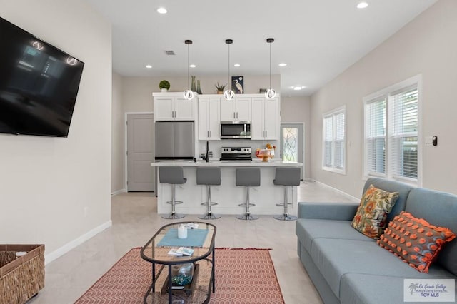 213B W Cora Lee Dr Unit B, South Padre Island, TX 78597 - living room featuring recessed lighting and baseboards