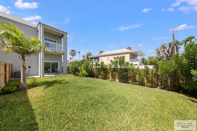 213B W Cora Lee Dr Unit B, South Padre Island, TX 78597 - fenced backyard with a balcony