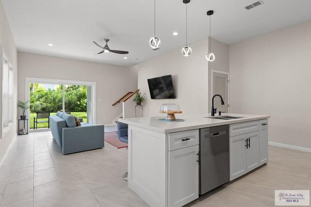 213B W Cora Lee Dr Unit B, South Padre Island, TX 78597 - kitchen featuring dishwasher, open floor plan, ceiling fan, light countertops, and a center island with sink