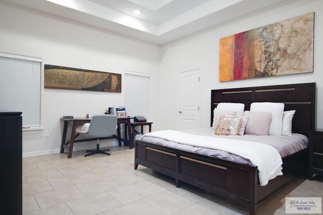 bedroom featuring light tile patterned floors