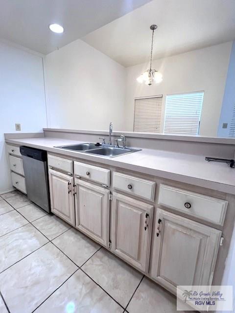 77 Santa Isabel Blvd Unit K1, Laguna Vista, TX 78578 - kitchen with dishwasher, a sink, light countertops, and light tile patterned flooring