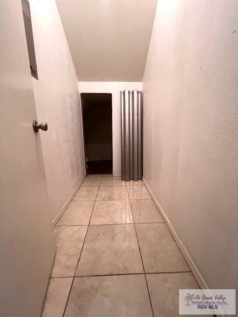 77 Santa Isabel Blvd Unit K1, Laguna Vista, TX 78578 - corridor featuring baseboards