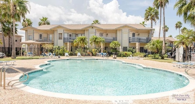 77 Santa Isabel Blvd Unit K1, Laguna Vista, TX 78578 - community pool with a patio