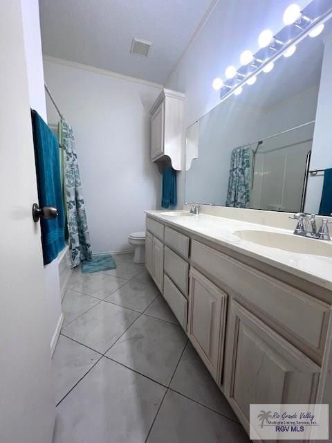 77 Santa Isabel Blvd Unit K1, Laguna Vista, TX 78578 - full bath with crown molding, toilet, double vanity, and shower / tub combo
