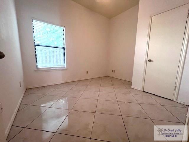 77 Santa Isabel Blvd Unit K1, Laguna Vista, TX 78578 - empty room featuring light tile patterned flooring