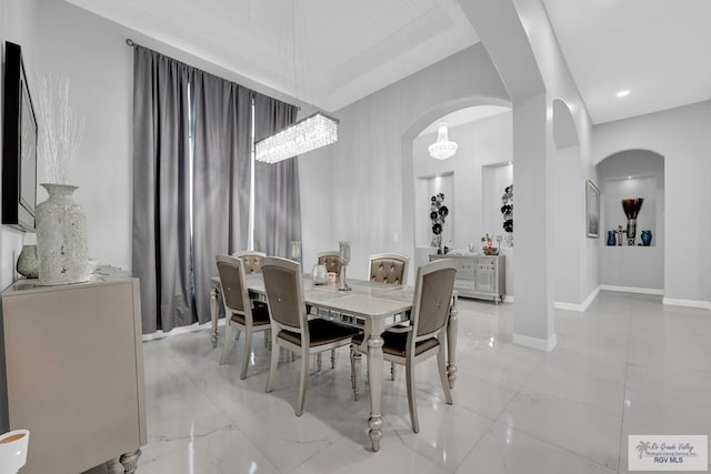 dining area featuring a chandelier