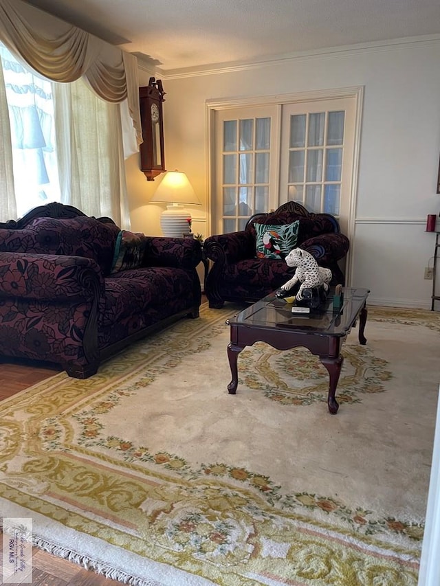 living room featuring crown molding