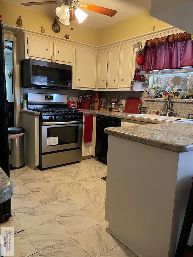 kitchen featuring backsplash, white cabinets, gas range, sink, and dishwasher