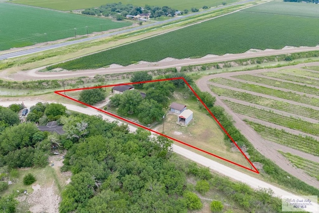 19863 Tilden Rd, San Benito, TX 78586 - aerial view of sparsely populated area with large plots for crops and property parcel outlined