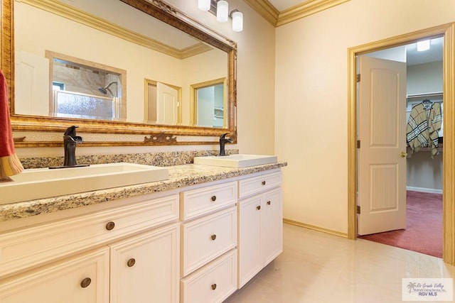 bathroom featuring a shower, tile patterned flooring, vanity, and ornamental molding