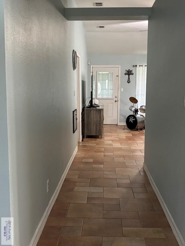 810 E Robin Ave Unit 53, Harlingen, TX 78550 - corridor with tile patterned flooring and baseboards