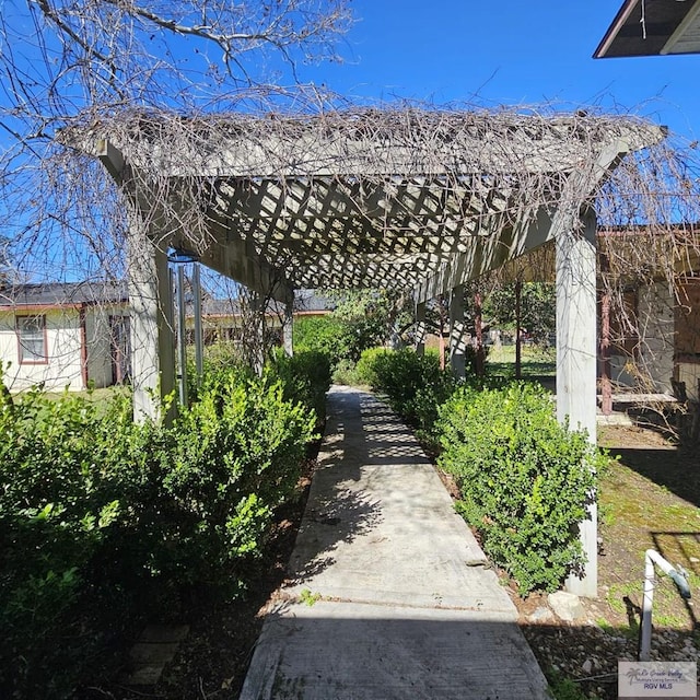 view of property's community featuring a pergola